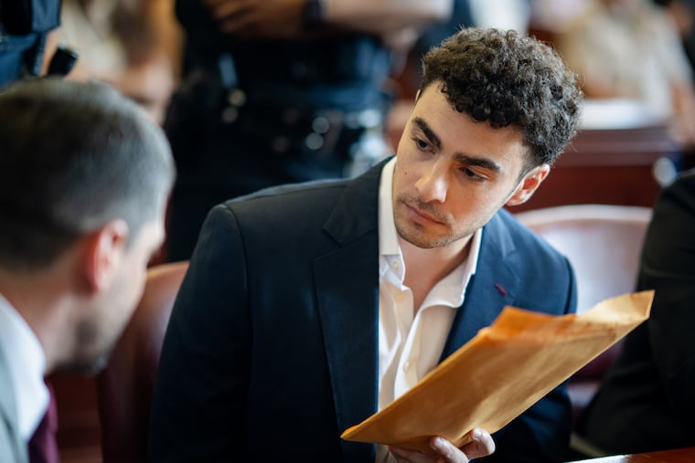 Luigi Mangione appears for a pre-trial hearing at Manhattan Criminal Court on Wednesday.