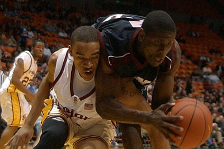 Koko Archibong was a 4-year letterman (2000-03) and started 99 games at Penn. (AP file photo)
