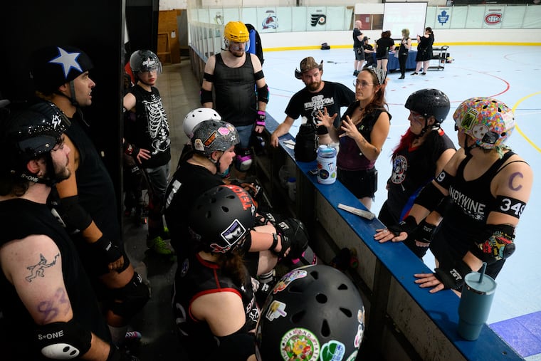 The Brandywine Roller Derby huddle on the bench at halftime during a bout at the 422 Sportsplex in Pottstown on Aug. 22, 2026. The league is looking for a space to host bouts and hold practices, but are struggling to find a place to rent in Chester County.