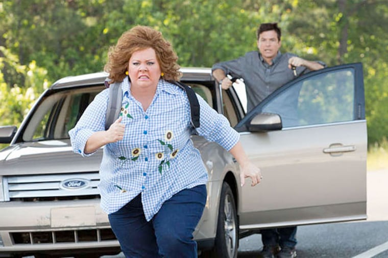 Melissa McCarthy gives Jason Bateman a run for his money as he tries to clear his name in "Identity Thief."