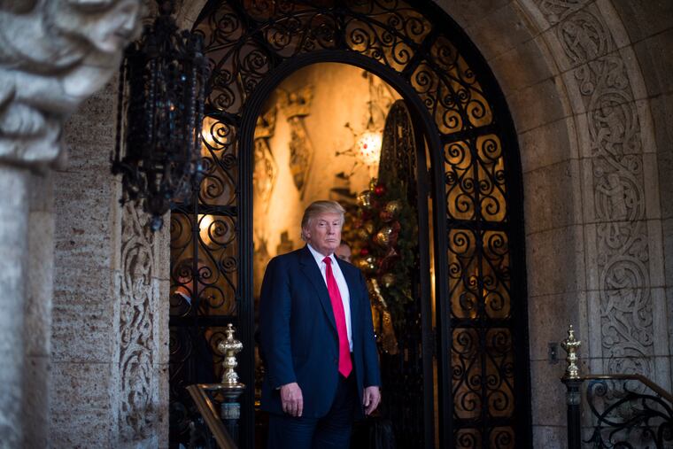 Donald Trump, seen in 2016 at his Mar-a-Lago Club in Palm Beach, Fla., claimed an FBI search at the club Monday was "not necessary or appropriate." Without evidence, he accused Democrats of weaponizing the "justice system" against him.