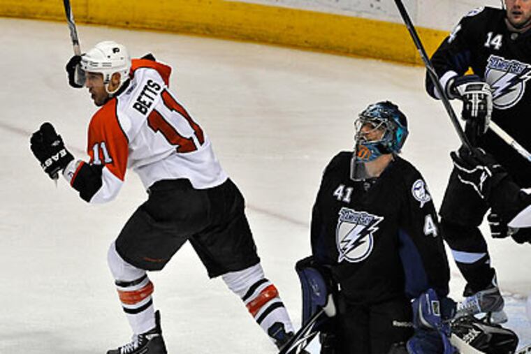 Blair Betts celebrated after scoring one of his two goals in the Flyers' win over the Lightning. (Steve Nesius/AP)