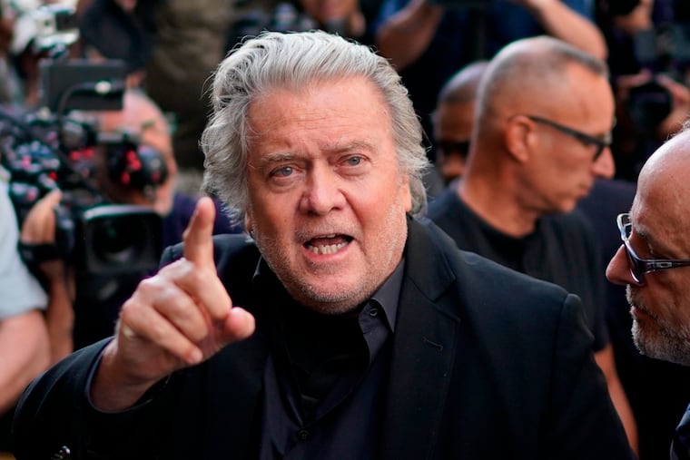 Former White House strategist Steve Bannon arrives at the Manhattan district attorney's office to surrender to New York authorities Thursday.