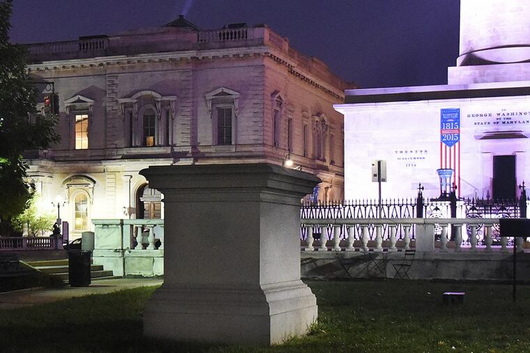 The empty pedestal of the statue of former Chief Justice Roger B. Taney in the Mount Vernon neighborhood in Baltimore after workers took down four Confederate monuments in the city. (Jerry Jackson/Baltimore Sun)