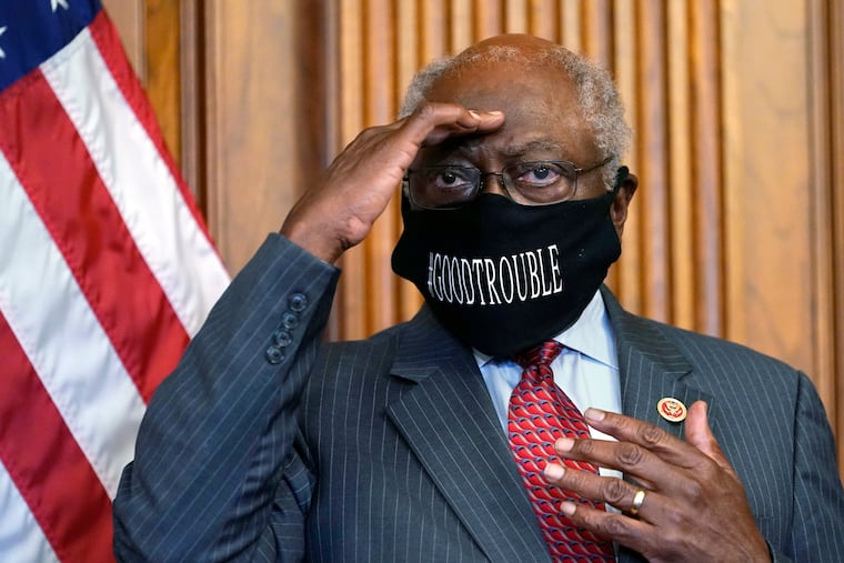 House Majority Whip James Clyburn, of S.C., shields his eyes from a television light during a news conference about COVID-19, on Capitol Hill in Washington. Clyburn, a member of the Selma Bridge Crossing Jubilee's honorary committee, believes one way to honor the memory of Lewis and others is to enact the John Lewis Voting Rights Act, to strengthen protections granted under the Voting Rights Act of 1965 and protect against racial discrimination and vote suppression.