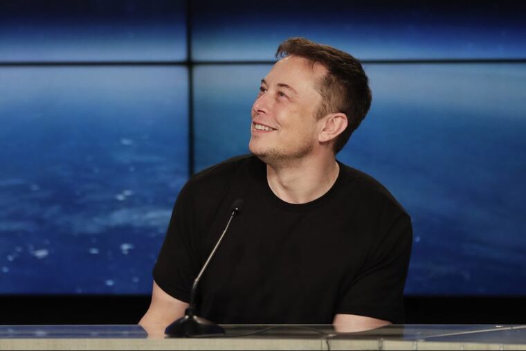 In this Feb. 6, 2018, file photo, Elon Musk, founder, CEO, and lead designer of SpaceX, speaks at a news conference after the Falcon 9 SpaceX heavy rocket launched successfully from the Kennedy Space Center in Cape Canaveral, Fla.