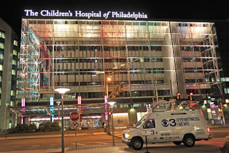 A television news van is parked in front of Children's Hospital of Philadelphia late Saturday night where Senator Rick Santorum is staying the night with his 3-year-old daughter, Bella, after she was admitted earlier Saturday. (Michael Bryant / Staff Photographer)