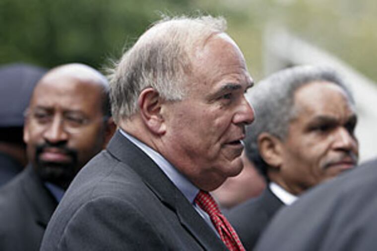 Gov. Ed Rendell (center), Mayor-elect Michael Nutter (left) and Mayor John Street (right) arrive at the Cathedral Basilica of Ss. Peter
and Paul to attend the funeral of slain police officer Charles Cassidy.