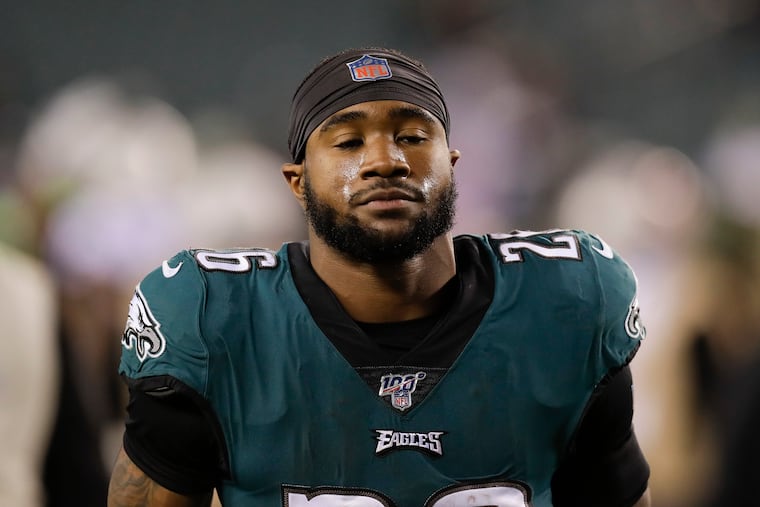 Eagles running back Miles Sanders walks off the field after Sunday's loss to the New England Patriots at Lincoln Financial Field.