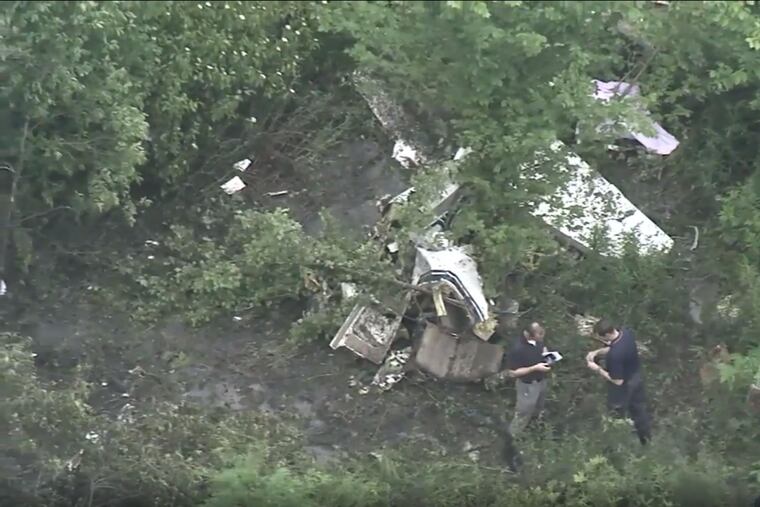 Two men were killed Wednesday when a small passenger plane crashed in a rural part of Springfield Township, Burlington County. The twin-engine, six-seat Beech Baron 58 plane came down about 9:15 a.m along Smithville-Jacksonville Road plowing through a field and across the roadway before tearing into a stand of trees and bursting into flames, officials and witnesses said.
