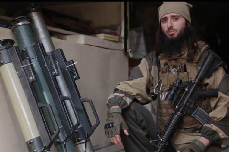 A screen grab from an ISIS video shows Zulfi Hoxha of Margate, N.J. issuing threats against the United States.