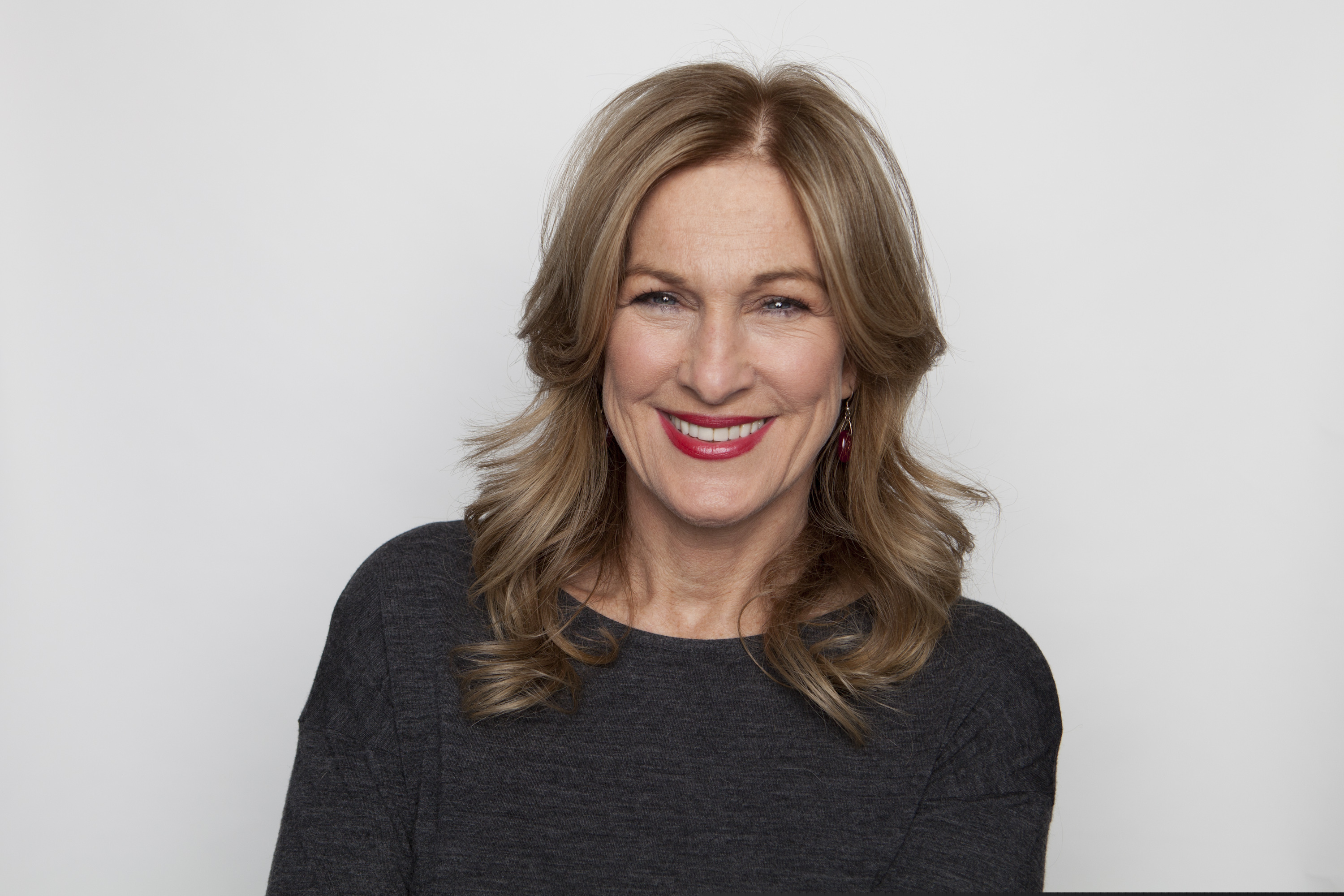 FILE - This Nov. 30, 2012 file photo shows Chief Executive Officer of (RED), Deborah Dugan posing for a portrait in New York. Dugan has been named president and CEO of the Recording Academy, becoming the first woman appointed to lead the organization. She will succeed Neil Portnow whose contract ends this year. (Photo by Amy Sussman/Invision/AP, File)