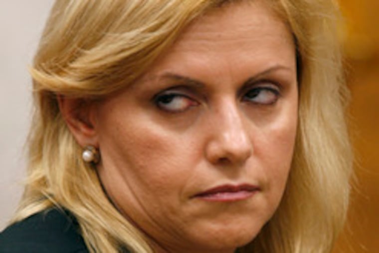 Dina Matos and former Gov. Jim McGreevey during their divorce trial yesterday. Dina Matos is seeking $2,500 a month in alimony for four years and $1,750 a month in child support.