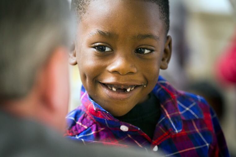 Kylie McKnight smiles at Mayor Kenney at Kinder Academy on Tuesday, Jan. 19, 2016.