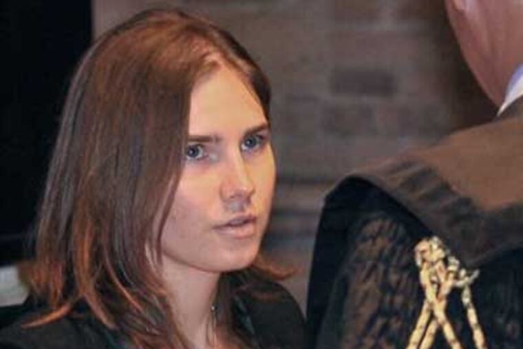 Amanda Knox speaks with her lawyer earlier in the trial. (AP Photo)