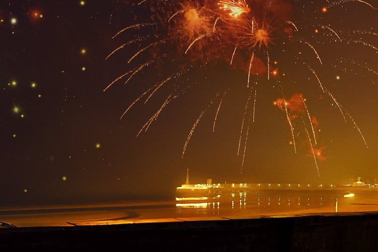 Micheal Ward and Olivia Colman in "Empire of Light," which releases this week in theaters.