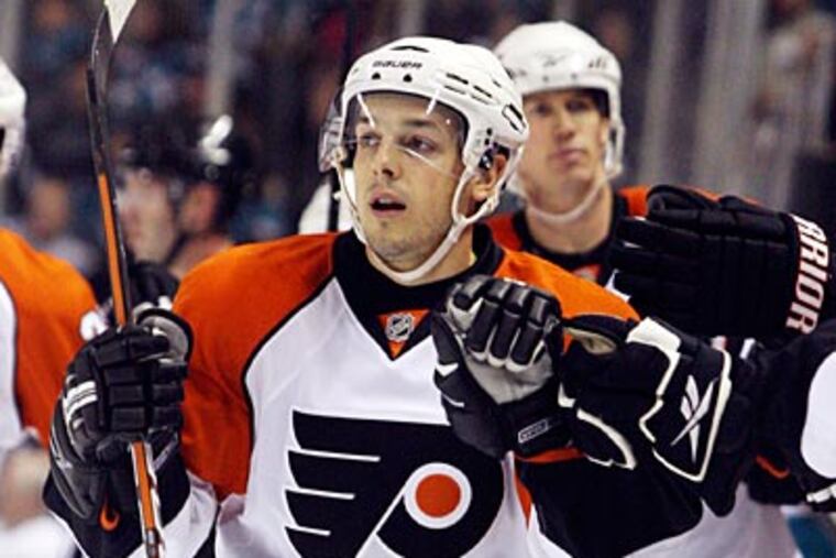 "We found a way to steal one, basically,'' Danny Briere said about Wednesday's win. (AP Photo/George Nikitin)