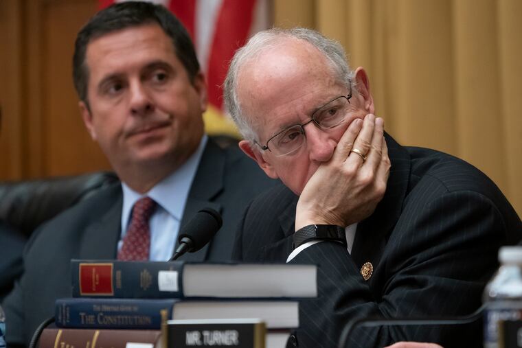 In this July 24, 2019 photo, Rep. Devin Nunes, R-Calif., left, the ranking member of the House Intelligence Committee, and Rep. Mike Conaway, R-Texas, listen as former special counsel Robert Mueller testifies to the House Intelligence Committee about his investigation into Russian interference in the 2016 election, on Capitol Hill in Washington. Conaway this week became the eighth Republican lawmaker to announce he won’t seek re-election.
