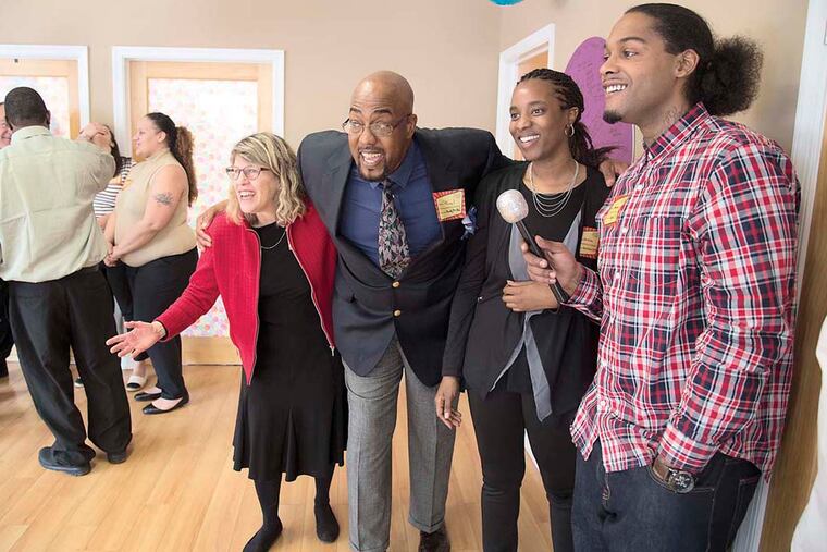 Jane Von Bergen (front left) participates in a team-building exercise with fellow SugarHouse Casino job candidates Darryl Washington, Lakiesha Selby, and Brandon White.