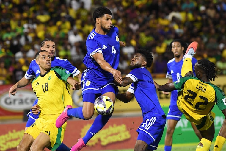 Curacao's Roshon Van Eijma (center) guided the nation past Jamaica last year to qualify for its first-ever World Cup. 