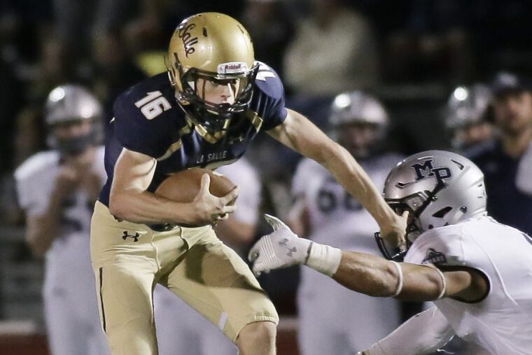 Quarterback Danny Solecki (16) and La Salle will take on Roman Catholic in a Catholic League Class 6A playoff semifinal at 7 p.m. Friday at Plymouth Whitemarsh.