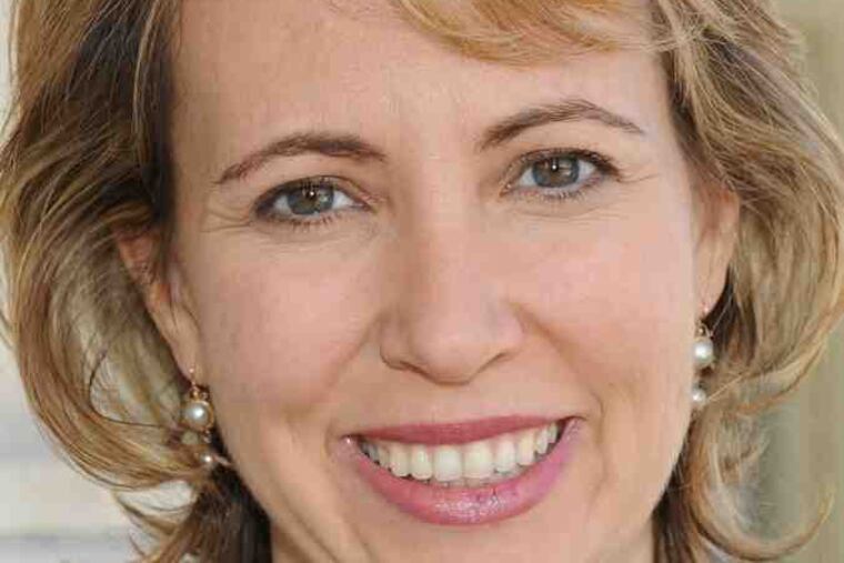 Rep. Gabrielle Giffords , one of 13 wounded. Six died.