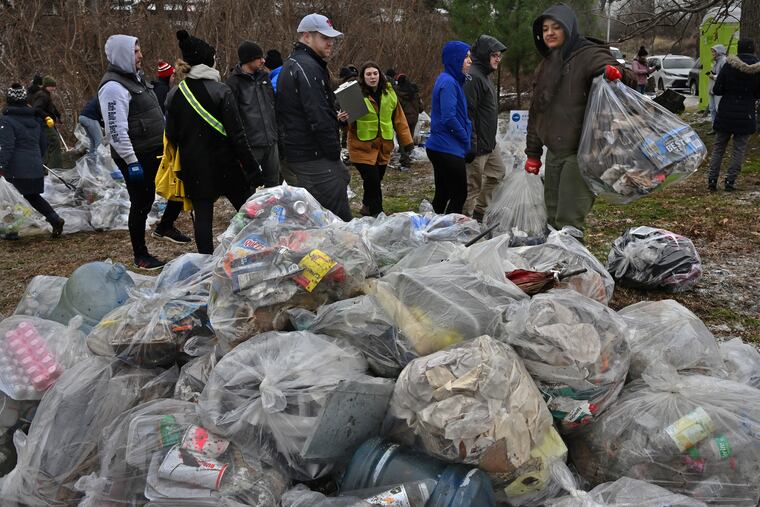 A Martin Luther King Jr. Day event in Washington, D.C., in January involved cleaning up plastic bottles and other items along railroad tracks.