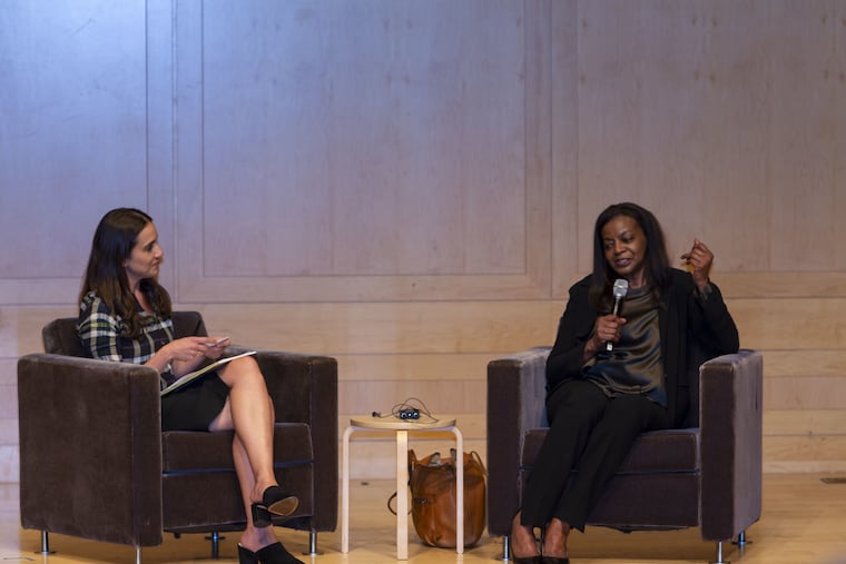 At the National Constitution Center, Lana Ulrich, the center's senior director of content, questions Duke University Professor Thavolia Glymph, a history and African American studies scholar who spoke to 105 judges and lawyers..
