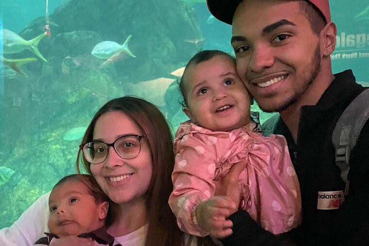 Ericka and Joshua with kids Mateo (left) and Leilanies.