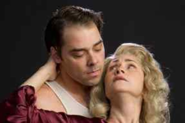 Jeff Coon and Susan Riley Stevens , Stanley Kowalski and Blanche DuBois in "A Streetcar Named Desire" at Walnut Street Theatre through March 1.