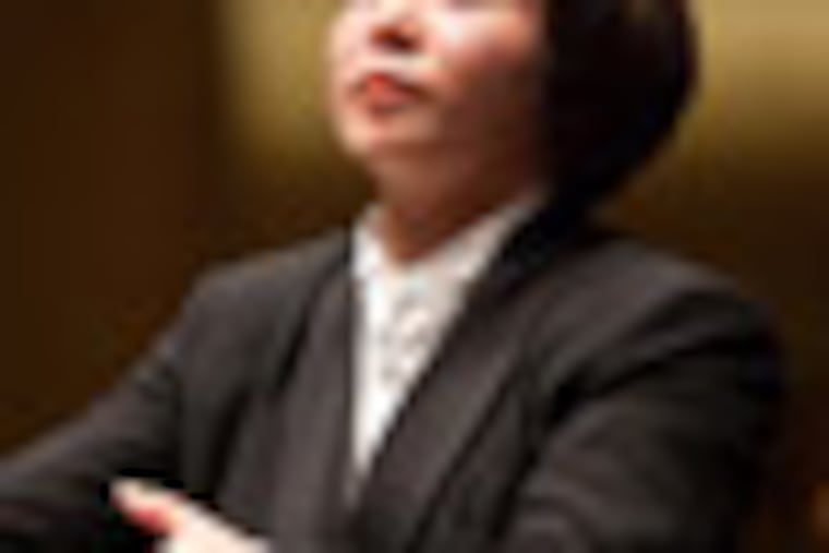 Xiang Zhang conducts the New York Philharmonic with Garrick Ohlsson on piano at Avery Fisher Hall, 11/12/09. Photo by Chris Lee
