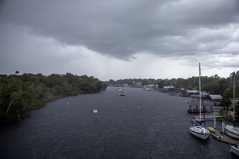 Heavy rain falls on an almost-empty Steinhatchee River in advance of the arrival of Tropical Storm Elsa last year. Ian was forecast to take a similar track.