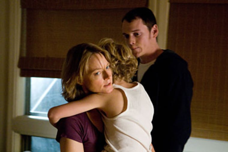 Jodie Foster with Riley Thomas Stewart (center) and Anton Yelchin in "The Beaver."