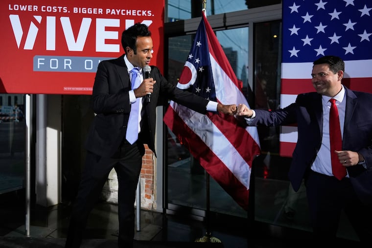 Republican Ohio gubernatorial candidate Vivek Ramaswamy, left, fist-bumps state Senate President Rob McColley during a watch party at the Spruce St. Sporting sports bar after winning the party?s nomination for governor Tuesday, May 5, 2026, in Columbus.
