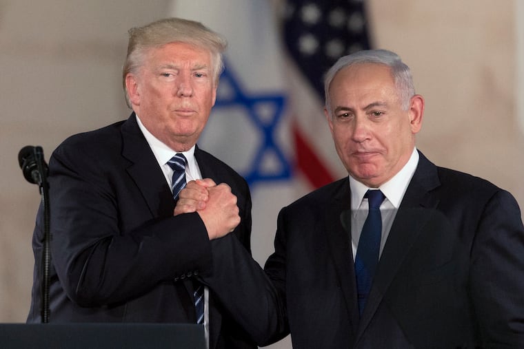 Donald Trump and Israeli Prime Minister Benjamin Netanyahu shake hands at the Israel Museum in Jerusalem in 2017.