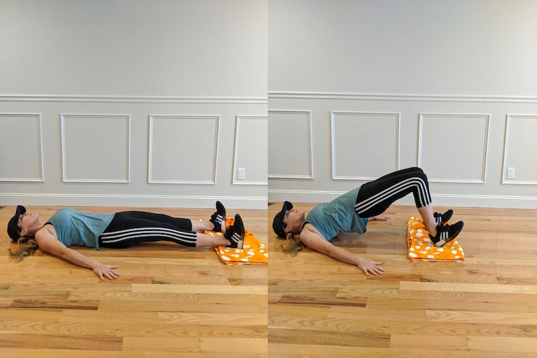 Demonstrating glute bridges.