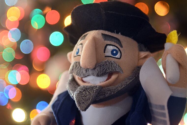 Moshe the Mensch on a Bench. TOM GRALISH / Staff Photographer