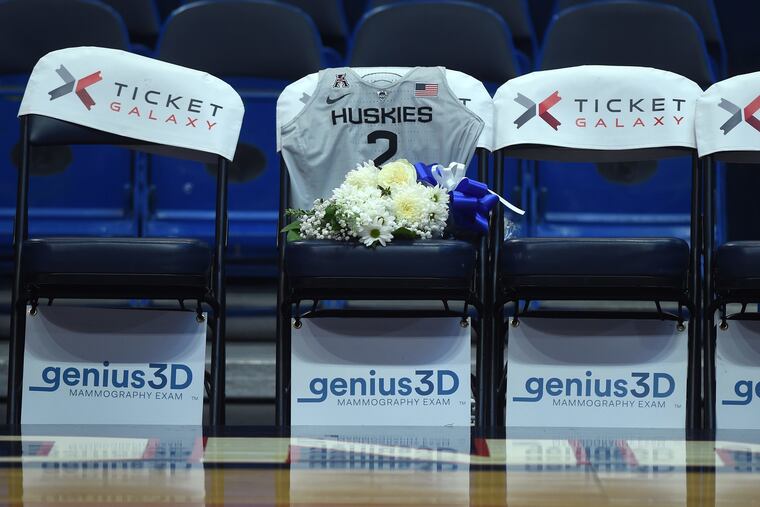 A spot on the UConn bench honored Gianna Bryant during Tuesday's exhibition game vs. Team USA.