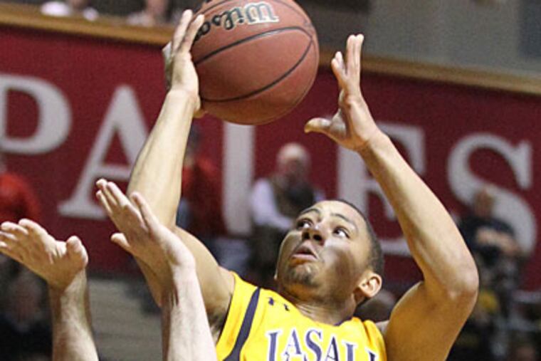 Guard Tyreek Duren was the game's leading scorer with 21 points. (Charles Fox/Staff Photographer)