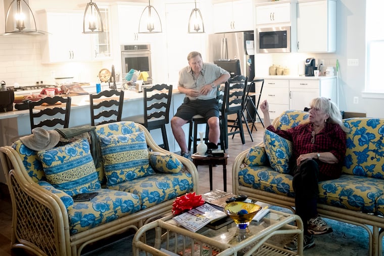 Robin and Stefanie Wohnsigl initially moved from an 8,000-square-foot house to a 1,500-square-foot apartment before their recent transition to a 3,700-square-foot single-family home in Chester, Md.