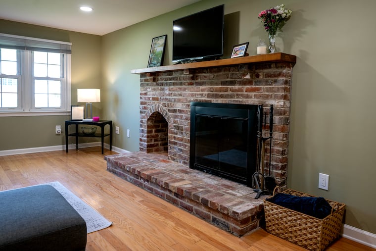 Valerie Rossi's favorite feature of the house is the giant, brick fireplace in the recreation room. 