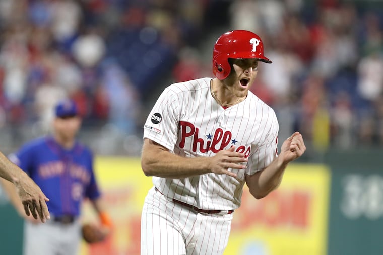 Brad Miller of the Phillies celebrates after hitting a solo home run against the Mets in the 6th inning at Citizens Bank Park on June 25, 2019. Miller recently purchased bamboo plants for the team as a good luck charm.