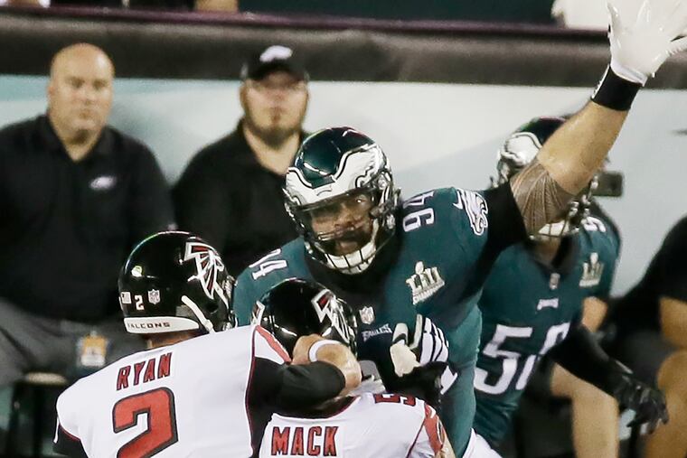 Eagles 94 Haloti Ngata tries to break upo a Matt Ryan Pass on the opening drive during the Atlanta Falcons at Phila. Eagles NFL game at Lincoln Financial Field in Philadelphia, Pa. on September 6, 2018, ELIZABETH ROBERTSON / Staff Photographer