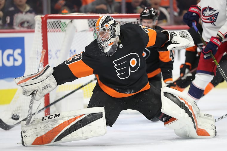Flyers rookie goaltender Carter Hart gives up a second-period goal against Columbus on Saturday.