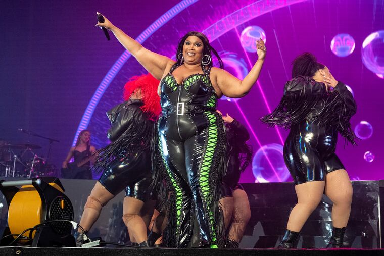 Lizzo has been sued by three former dancers who accuse the Grammy winner of sexual harassment and allege the singer and her production company created a hostile work environment.