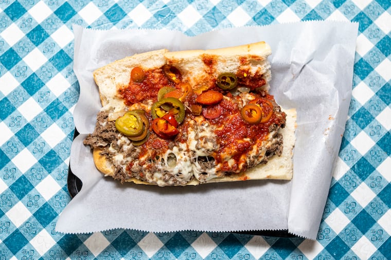 A cheesesteak at Mama’s Pizzeria with sauce, peppers, and onions in Bala Cynwyd, Pa., on Thursday, Feb. 16, 2023.