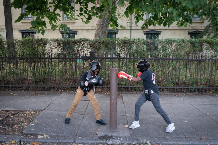Participants in the boxing program Guns Down Gloves Up. The city suspended a $392,000 grant given to the anti-violence effort, which is subject to at least two investigations.