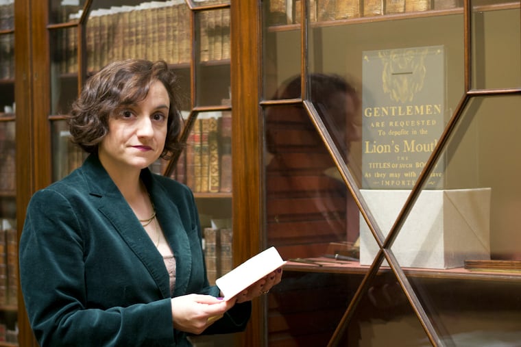 Library Company curator of printed books Rachel D'Agostino with the rakish review.