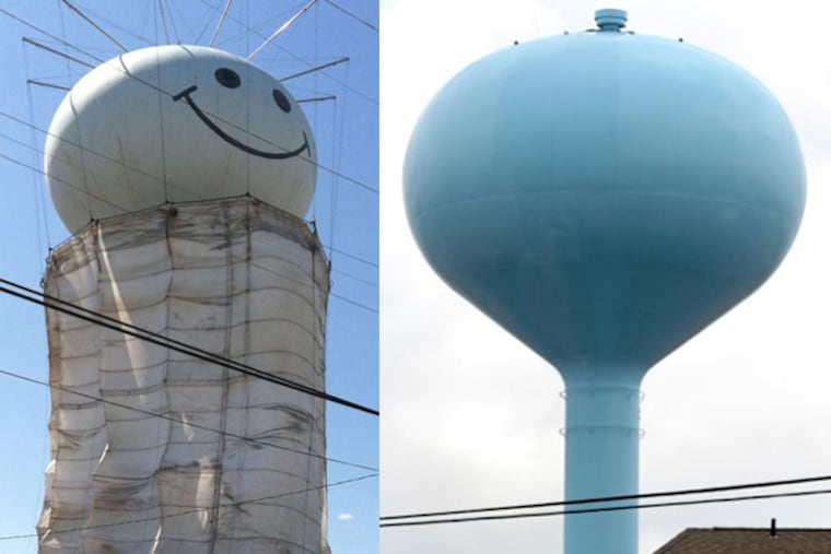 The iconic smiley face on Longport's watertower (left) has gone missing this summer after a painting contract went awry. (Tom Gralish / Staff Photographer )
