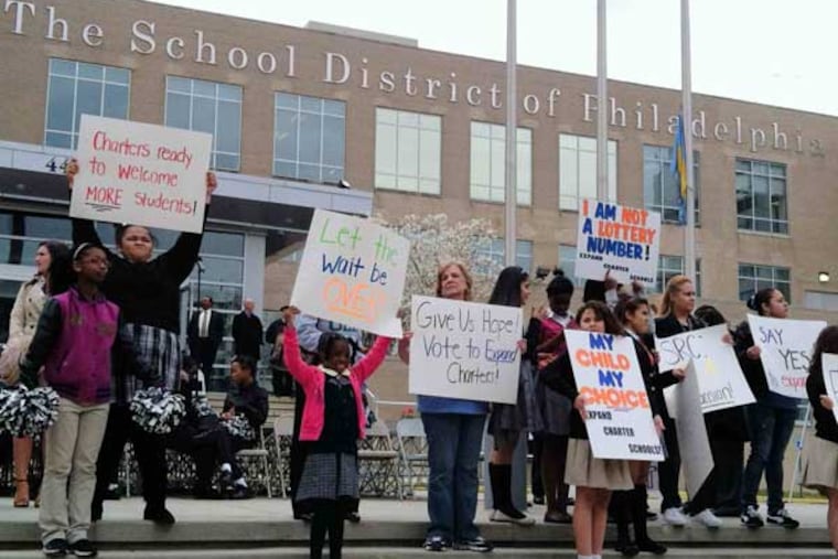 Students, parents, and supporters of charter schools rally outside the Philadelphia school administration building in 2013.